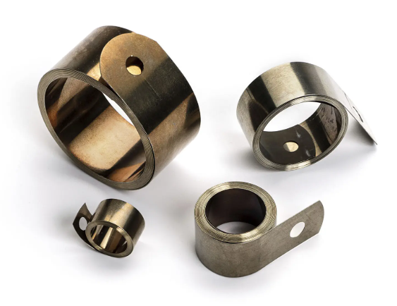 Constant force spring — flat strip coil that delivers uniform tension throughout extension