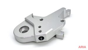 Anodized aluminum bracket with a uniform matte silver surface